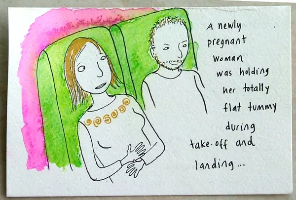 A newly pregnancy woman was holding her totally flat tummy during take-off and landing...