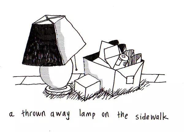 a thrown away lamp of the sidewalk