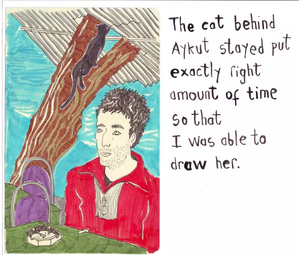 The cat behind Aykut stayed put exactly right amount of time so that I was able to draw her.
