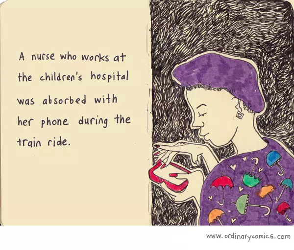 A nurse who works at the children's hospital was absorbed with her phone during the train ride.